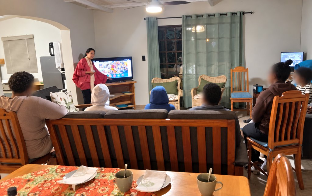 Young people at Ya Bana Village during a financial literacy discussion